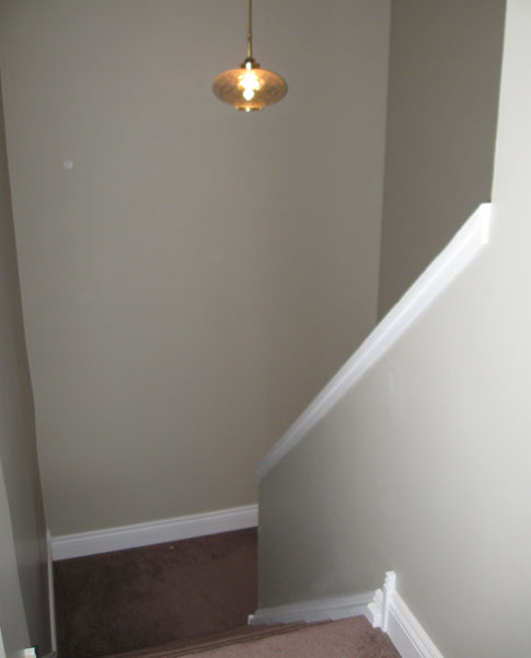 Dressing Up a Stairway with a $5 Mirror