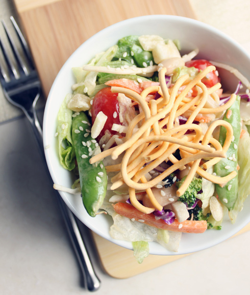 Sesame Asian Salad Topped with Crispy Noodles