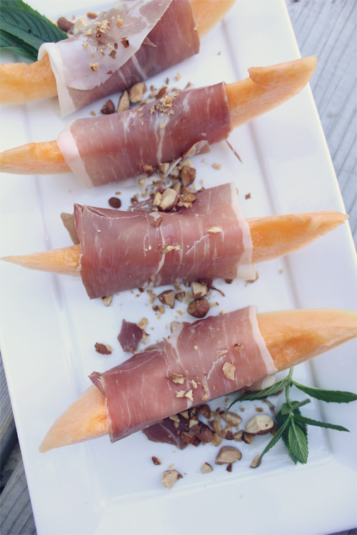 Prosciutto Wrapped Melon with Crushed Almonds