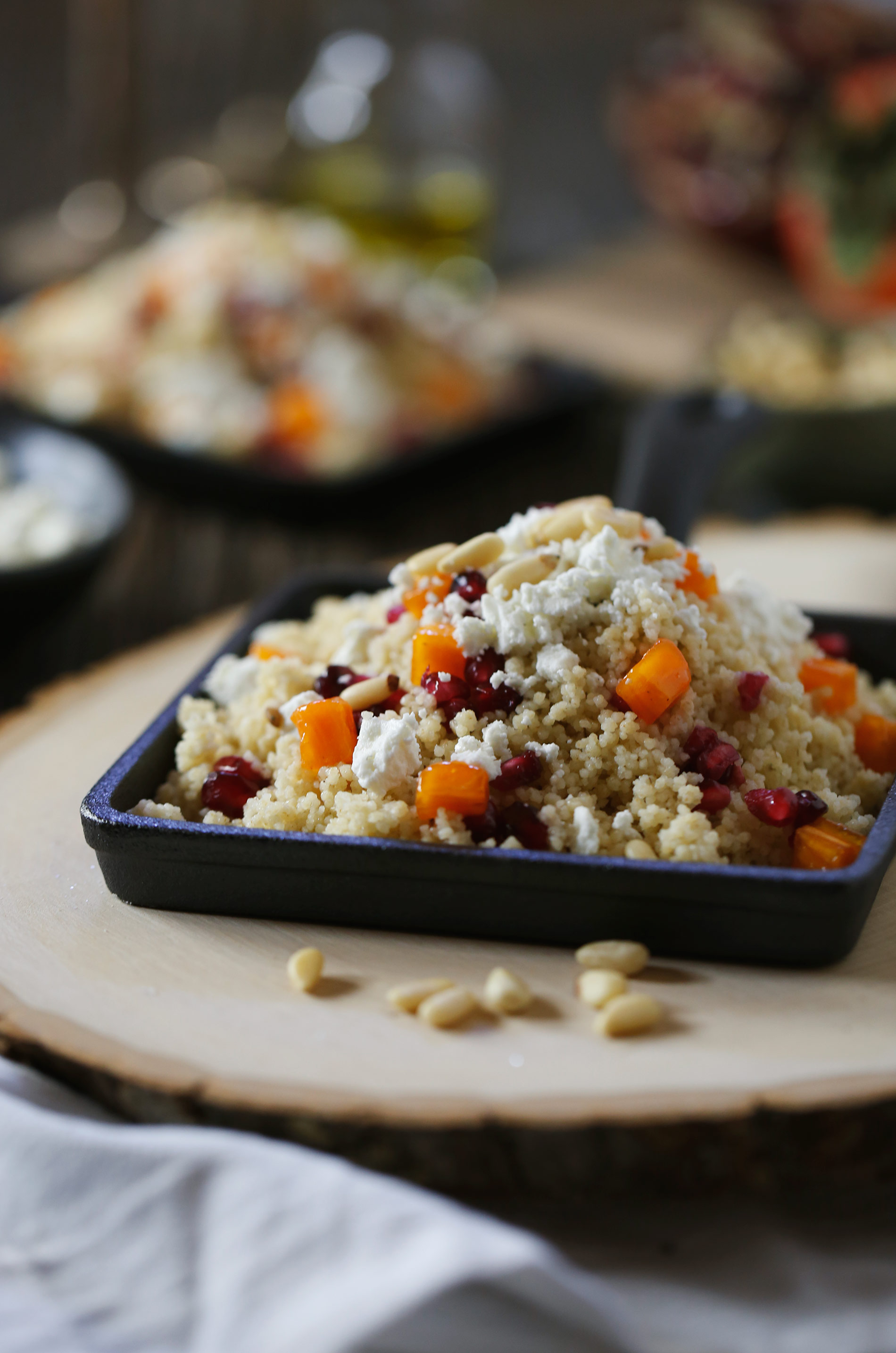 Couscous Salad with Persimmons, Pomegranates & Goat Cheese