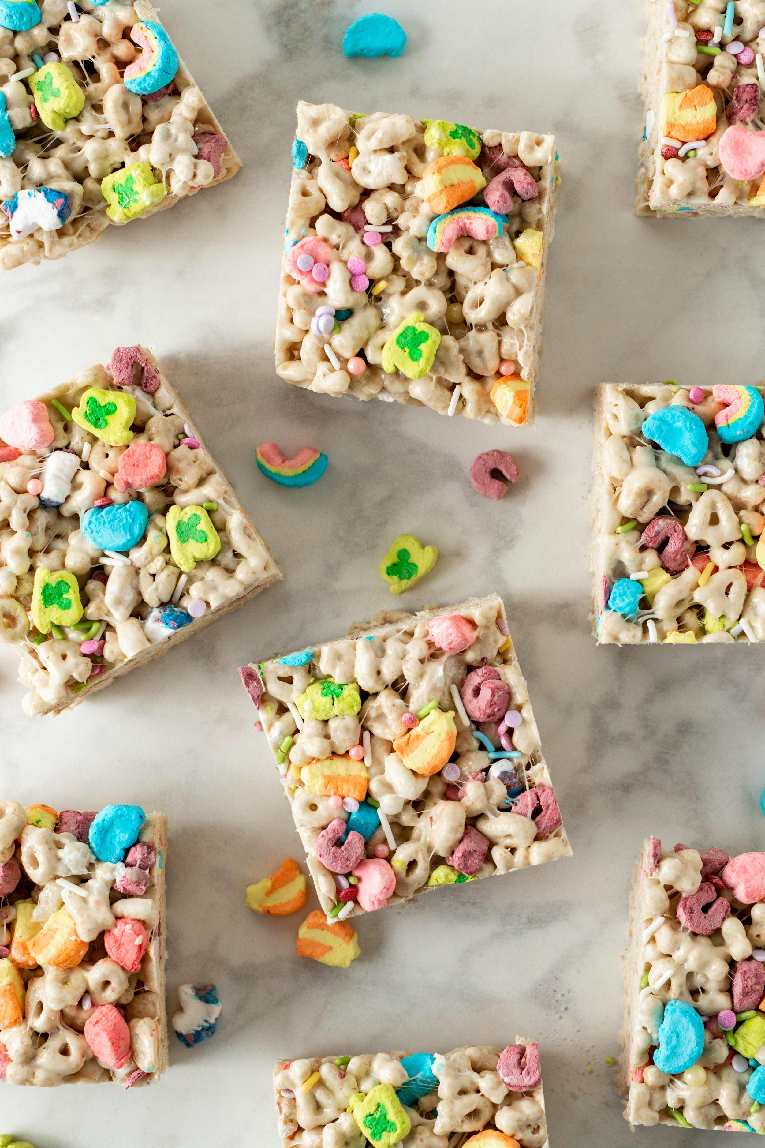 Lucky Charms Marshmallow Crispy Treats cut into squares on countertop